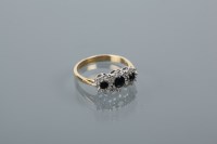 Lot 1727 - THREE STONE SAPPHIRE AND DIAMOND CLUSTER RING...