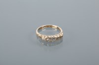 Lot 1733 - DIAMOND FIVE STONE RING set with five...