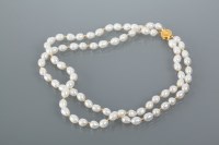 Lot 1743 - FRESHWATER PEARL NECKLACE formed by two...