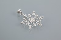 Lot 1752 - DIAMOND SNOWFLAKE PENDANT set with thirteen...