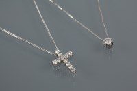 Lot 1758 - EIGHTEEN CARAT WHITE GOLD DIAMOND SET CROSS...