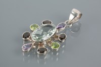 Lot 1768 - MULTI GEM AND SET PENDANT set with round, oval...