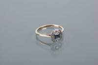 Lot 1779 - ART DECO SAPPHIRE AND DIAMOND RING with a...