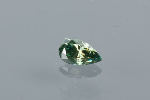 Lot 1849 - UNMOUNTED FANCY LIGHT GREEN DIAMOND pear cut,...