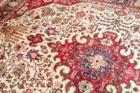 Lot 795 - PERSIAN WOOL RUG hand woven in Tabriz, Iran,...