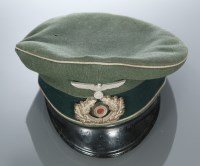 Lot 823 - WORLD WAR II GERMAN PEAKED CAP green wool with...