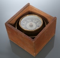 Lot 585 - BRASS SHIP'S COMPASS cased in wood, the case...