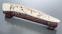 Lot 265 - IVORY CARVED TUSK showing a family of...