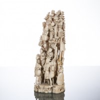 Lot 313 - CHINESE IVORY CARVING with figures in a...