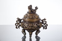 Lot 411 - CHINESE BRONZE CENSER with foe dog finial and...