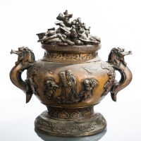 Lot 443 - CHINESE BRONZE LIDDED URN with mythical...