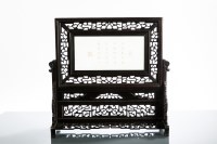 Lot 465 - CHINESE JADE AND WOOD TABLE SCREEN with relief...