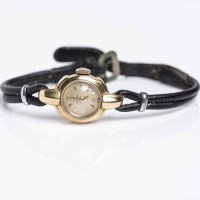 Lot 746 - LADY'S EIGHTEEN CARAT GOLD OMEGA COCKTAIL...