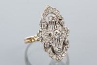 Lot 1630 - ORNATE DIAMOND CLUSTER RING of pierced design,...