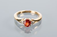 Lot 1633A - DIAMOND AND RUBY SET CLUSTER RING the central...