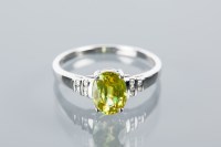 Lot 1635A - EIGHTEEN CARAT GOLD SPHENE AND DIAMOND CLUSTER...