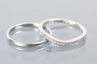 Lot 1637A - EIGHTEEN CARAT GOLD DIAMOND HALF ETERNITY RING...