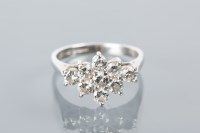 Lot 1641 - DIAMOND CLUSTER RING with a boat shaped...