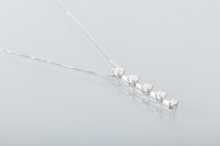 Lot 1654 - DIAMOND PENDANT set with a vertical graduated...