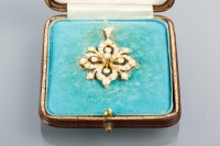 Lot 1663A - VICTORIAN PEARL SET HOLBEIN of pierced floral...
