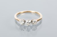 Lot 1668A - DIAMOND THREE STONE RING set with three...