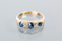 Lot 1671 - SAPPHIRE AND DIAMOND FIVE STONE RING set with...