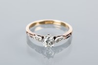 Lot 1675 - DIAMOND SOLITAIRE RING the central brilliant...