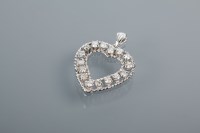 Lot 1688 - DIAMOND SET HEART SHAPED PENDANT set with...