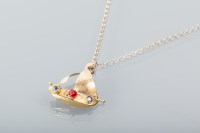 Lot 1691 - SHIP MOTIF PENDANT ON CHAIN set with three...
