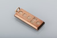 Lot 1692 - NINE CARAT GOLD INGOT PENDANT