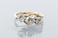Lot 1700 - DIAMOND THREE STONE RING the brilliant cut...
