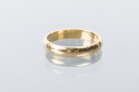 Lot 1703 - EIGHTEEN CARAT GOLD WEDDING BAND hallmarked,...