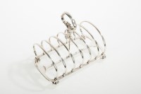 Lot 330 - VICTORIAN SILVER SIX DIVISION TOAST RACK maker...