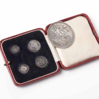 Lot 1562 - SET OF GEORGE V MAUNDY MONEY IN A RED LEATHER...