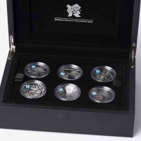 Lot 1575 - ROYAL MINT CELEBRATION OF BRITAIN FIVE POUND...