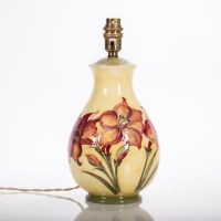 Lot 477 - MOORCROFT 'AFRICAN LILY' PATTERN LAMP...