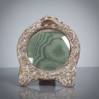 Lot 43 - EDWARDIAN SILVER MOUNTED PHOTOGRAPH FRAME of...