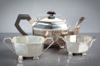 Lot 56 - GEORGE V SILVER THREE PIECE TEA SERVICE...