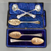 Lot 89 - THREE GEORGIAN SILVER BERRY SPOONS AND A PAIR...