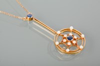 Lot 1111 - EDWARDIAN SAPPHIRE AND SEED PEARL PENDANT...