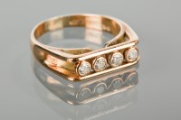 Lot 1132 - DIAMOND FOUR STONE RING with four brilliant...