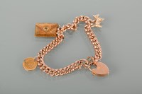 Lot 1153 - NINE CARAT GOLD CURBLINK BRACELET with charms...