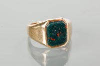 Lot 1180 - BLOODSTONE SET SIGNET RING set with an...
