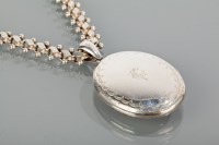Lot 1190A - VICTORIAN SILVER LOCKET engraved with a...