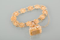 Lot 1194 - CHINESE GOLD BRACELET the links decorated with...