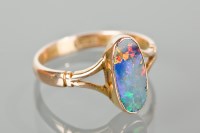 Lot 1197 - TRIPLET OPAL DRESS RING with an oval triplet...