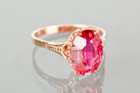 Lot 1207 - RUSSIAN CREATED RUBY RING with a large oval...