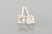 Lot 1220 - PAIR OF DIAMOND STUD EARRINGS each set with a...