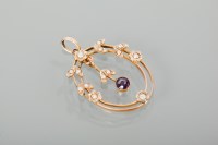 Lot 1221 - EDWARDIAN AMETHYST AND SEED PEARL PENDANT of...