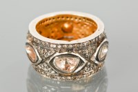 Lot 1223 - INDIAN POLKI DIAMOND RING with six large polki...